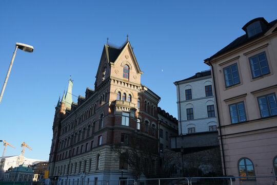 Low angle view of buildings against blue sky