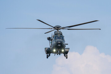 Black painted modern military transport helicopter in Hungary