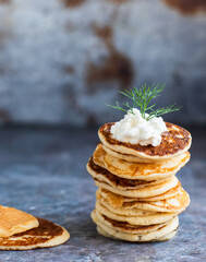Easy blini. Russian pancake with cheese and serrano ham