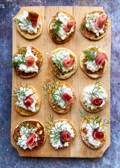 Easy blini. Russian pancake with cheese and serrano ham
