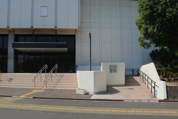 A ramp leading to the building's entrance, designed for people with disabilities, the elderly,...