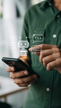 Digital Age: Man Interacts with Chatbot AI on Smartphone, Shaping the Future of Conversational Technology.
