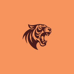 Screaming tiger logo in bold and fierce silhouette design.