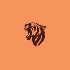 Screaming tiger logo in bold and fierce silhouette design.