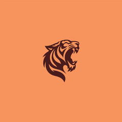Screaming tiger logo in bold and fierce silhouette design.