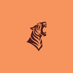 Screaming tiger logo in bold and fierce silhouette design.