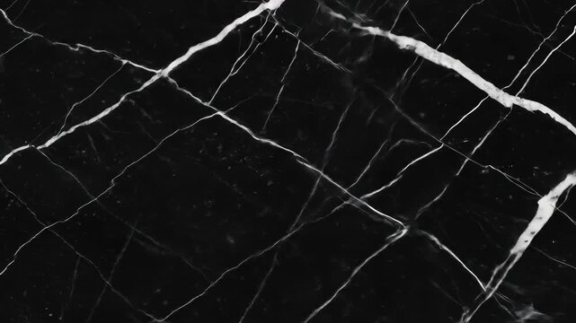 Black marble texture with white veins pattern offering a sophisticated, elegant stone background design.