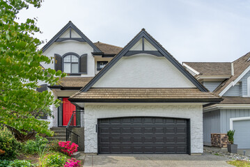 arage door in luxury house with nice landscape in Spring in Vancouver, Canada, North America. Day...