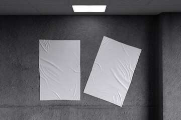 White blank paper poster with lamp on concrete wall background for mockup template