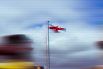 An England St Georges flag flying in the wind. With a a dystopian, warped edit.