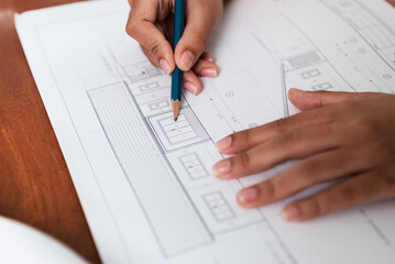 Architectural design planning office workspace blueprint indoor close-up creative process