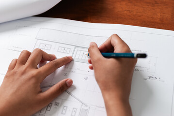 Architectural blueprint review office environment design process creative studio close-up perspective