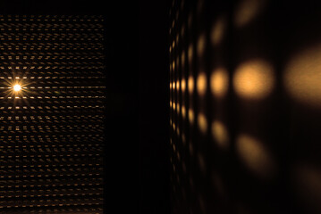 Sunrise through blinds creating an abstract effect. The morning sun shining through window blinds...