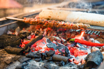 Adana kebap on the grill