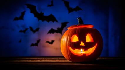 Glowing jack o lantern with bats flying halloween pumpkin