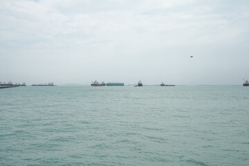 seascape with cargo ships and clear sky on a calm day