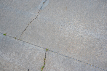 Obraz premium Even the hardest surfaces show their scars—every crack tells a story, Norcross, Georgia, United States of America