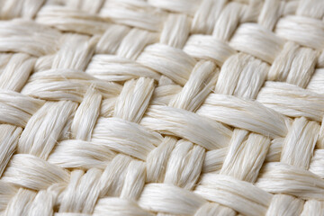 Close-up of Natural Fiber Fabric Showcasing Intricate Weaving Patterns and Textures Suitable for Various Crafts and Designs