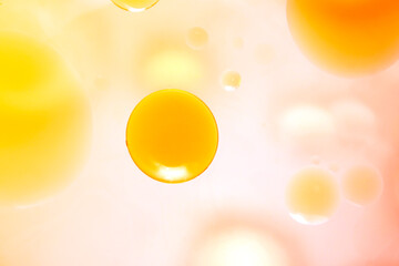 Colorful Abstract Background with Floating Yellow and Orange Spheres
