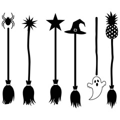 A vector illustration of witch's brooma set of black silhouettes