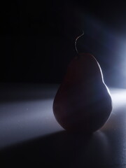 light pear on black background