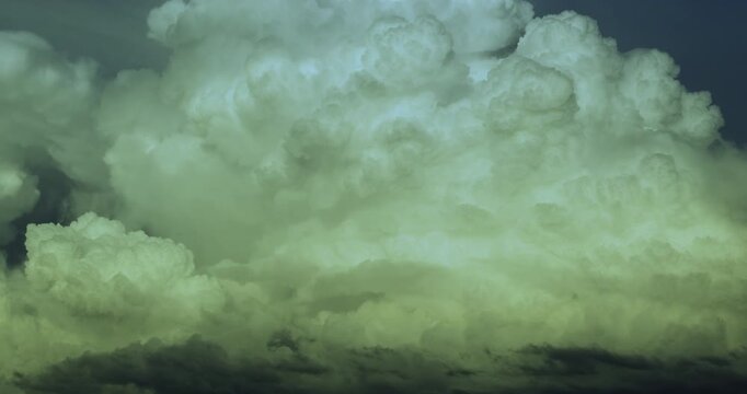 Massive Towering White Cumulonimbus Forming Supercell Thunderstorm in 4K Time Lapse Capturing  Growth and Rotating Updrafts Building Dramatic Storm Structure