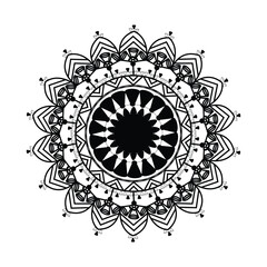 Intricate black and white mandala design with radial symmetry