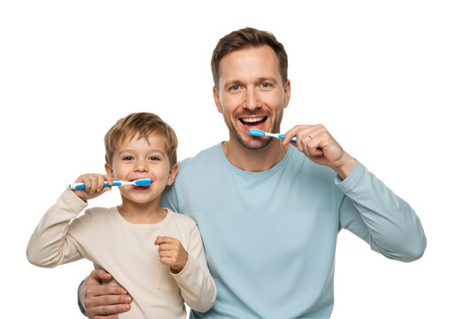 father and son brushing teeth