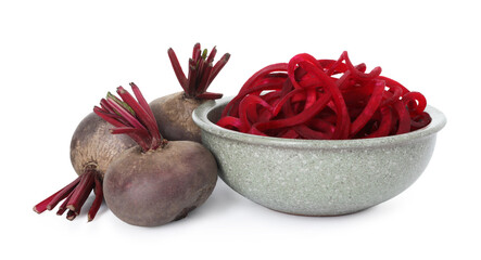 Raw beetroot noodles and fresh vegetables isolated on white. Vegetarian dish