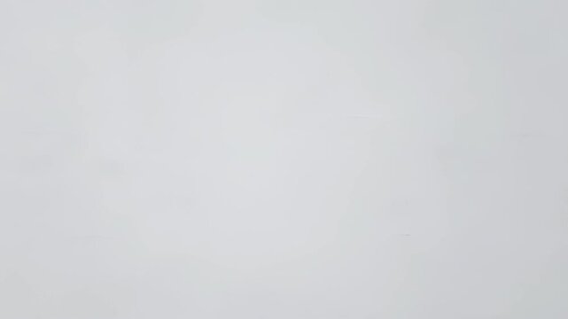 Textured white background with subtle imperfections and shadows