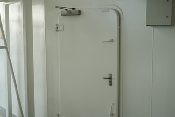 modern industrial metal door in a brightly lit environment