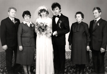 Slovakia - circa 1979: Bride and groom and their parents on their wedding day.