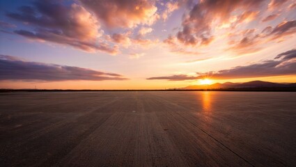 Vast Concrete Expanse Under Dramatic Sunset Sky