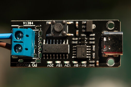 Closeup image of a circuit board with the inscription pdt