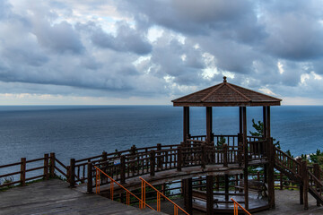 observatory and cloudy sea