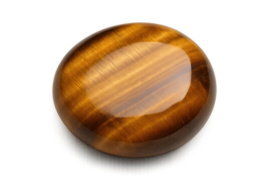 Polished tiger eye gemstone cabochon on a transparent background, exhibiting its chatoyant, silky luster