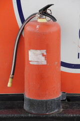 Close-up of a fire extinguisher in a fuel pump