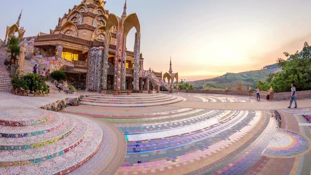 The colorful wat phra that pha son kaew temple gleams at sunset