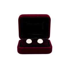 Elegant cufflinks in a luxurious velvet box perfect for adding a touch of sophistication to any formal attire