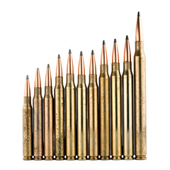 A collection of gleaming rifle bullets of various sizes lined up in a row showcasing precision engineering and metallic shine