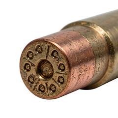 Close up view of a bullet tip showcasing intricate rifling marks and copper jacket details perfect for weapon and ammunition themes
