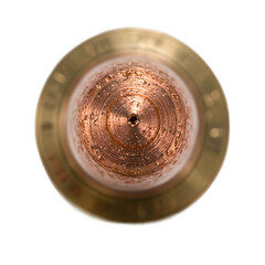 Close up view of a bullet tip showcasing intricate rifling marks and copper jacket details perfect for weapon and ammunition themes