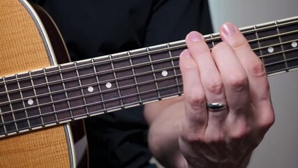 Educational diagram illustrating finger positioning for playing D minor chord on acoustic guitar fretboard