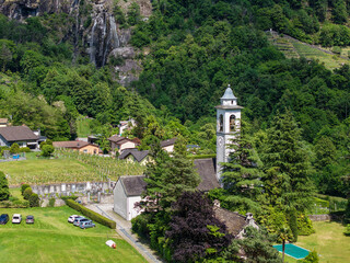 Drone view at the church of Maggia in the italian part of Switzerland