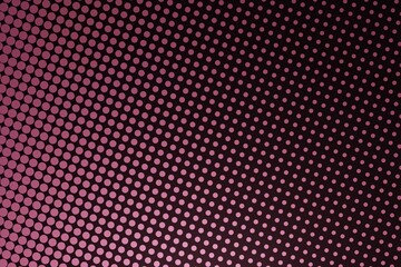 Velvet maroon dots on black background. Light is coming from bottom