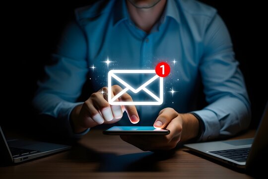 Businessman using email marketing tools on laptop and smartphone, sending newsletters and analyzing campaign performance to engage subscribers and grow business through personalized content  - Powered by Adobe