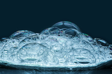 Beautiful soap bubbles of detergent or shower gel.