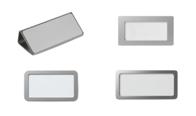 Minimalist presentation of silver name tags on a stark white background showcasing modern simplicity