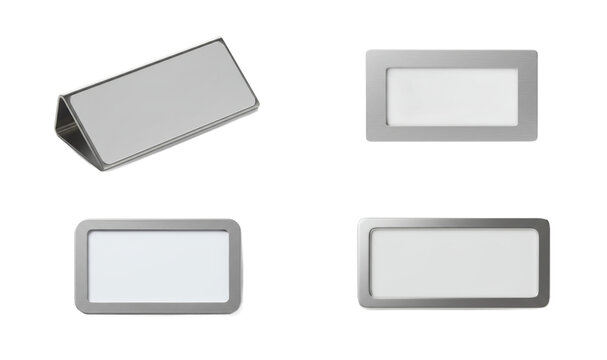 Minimalist presentation of silver name tags on a stark white background showcasing modern simplicity