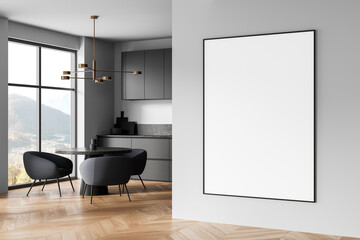 Modern dining area with large blank poster mockup on clean gray wall in bright minimal interior...